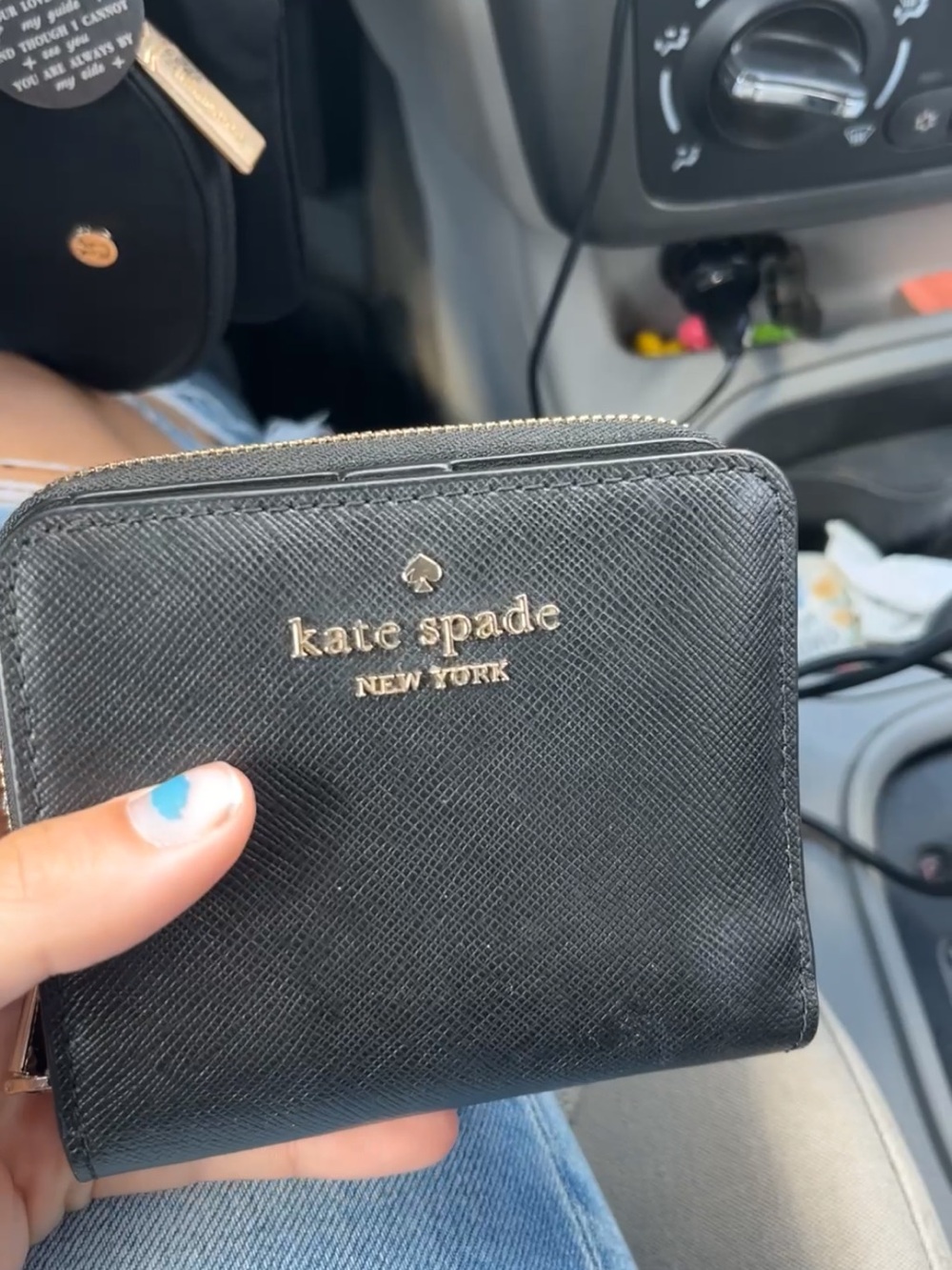 kate spade Black Saffiano Zip Around Wallet with Gold Logo